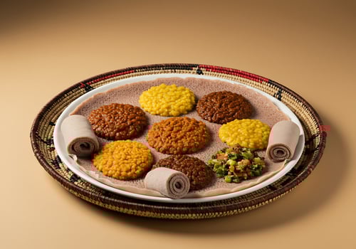 Ethiopian Cuisine Injera with Assorted Stews photo