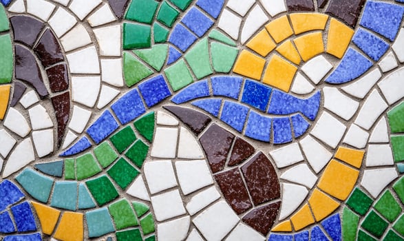 Colorful mosaic pattern featuring various shapes and vibrant colors. photo