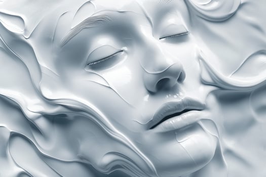 A serene, ethereal face with closed eyes emerges from a smooth, fluid white surface, conveying tranquility and calmness. photo