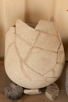 Fragments of pottery archaeology, at anold archaeological site in Israel photo