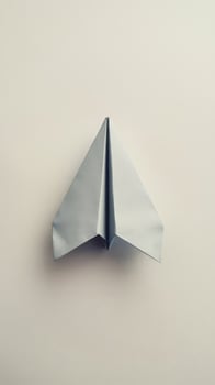 Paper plane origami isolated on a white background photo