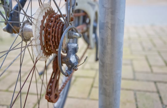 Close-Up of Rusty Bicycle Gear and Chain photo