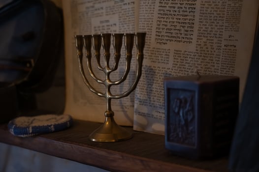 Jewish menorah on a shelf in a jewish home photo
