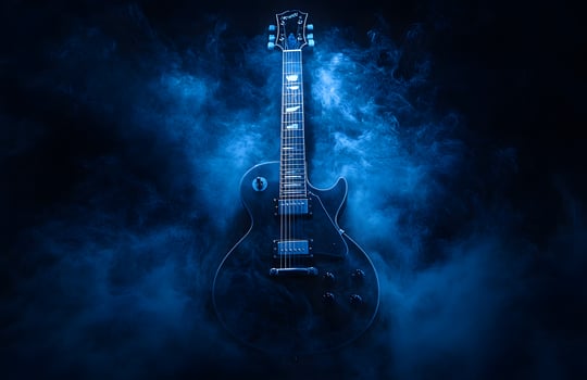 Electric Guitar in Blue Smoke Artistic Image photo
