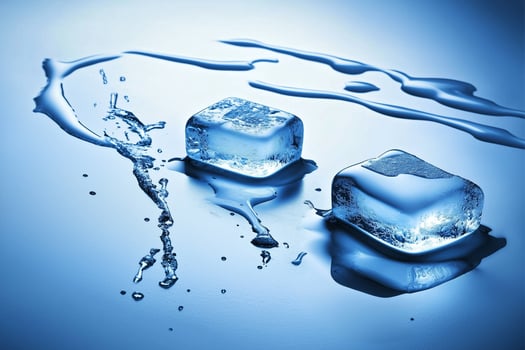 Closeup of Ice Cubes on White Background with Water Drops and Reflection in Soft Blue Lighting photo