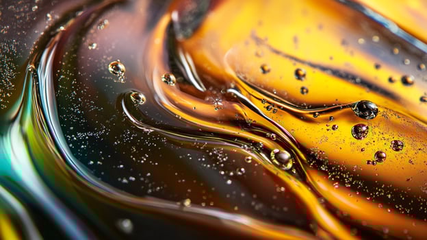 Abstract beauty, mesmerizing flow, shimmering and smooth golden texture with bubbles. A captivating macro view, colorful, and elegant. photo