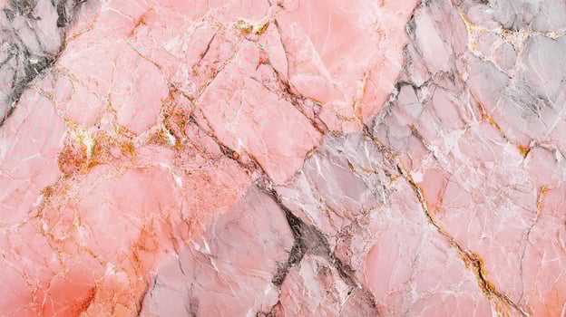 A captivating blend of rosy hues and smoky grays intertwine within this stone formation, creating an earthy and visually striking marble slab. photo