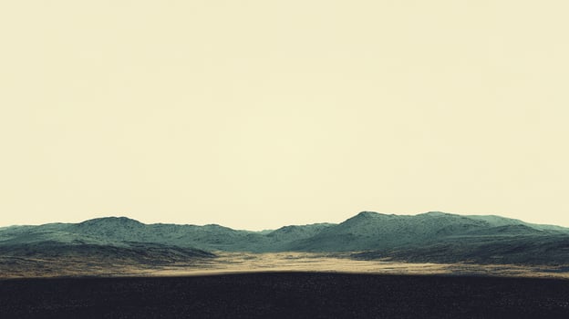 Serene mountain range under a bright sky, with a dark foreground adding depth and contrast to the tranquil landscape scenery. photo