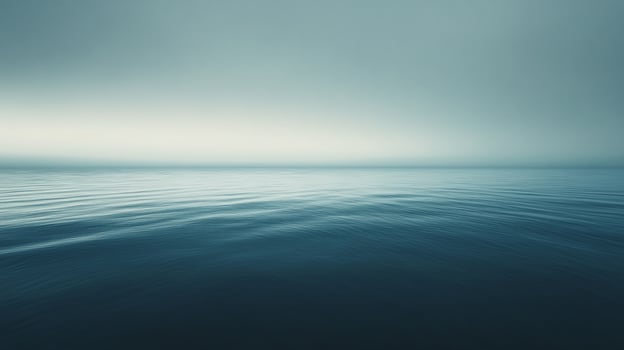 Serene ocean view with a calming gradient sky. Gentle waves create a peaceful, almost ethereal atmosphere. Ideal for relaxation themes. photo