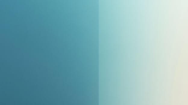 A captivating, minimalistic composition featuring a seamless blend of light and dark teal hues, separated by a crisp, vertical gradient. photo