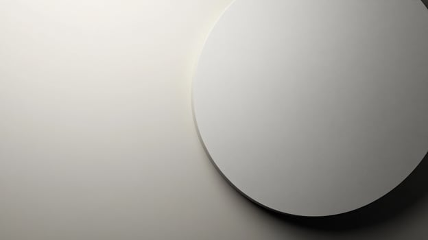 Abstract minimalist composition with a round, geometric shape set against a gradient neutral background in light gray tones. photo