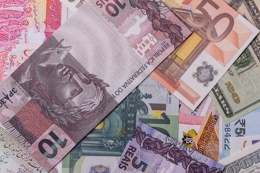 A background consisting of paper banknotes of different color photo