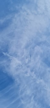 Vertical photography of blue sky and clouds photo
