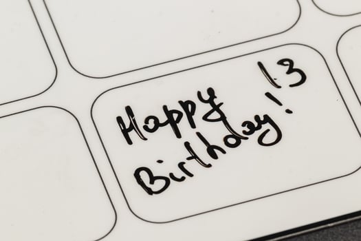 Creative birthday message written on a label with a black marker photo