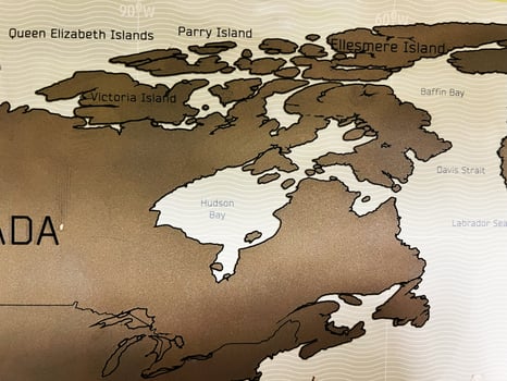 Map depiction showing Canadian Arctic islands with key geographic features in bold photo
