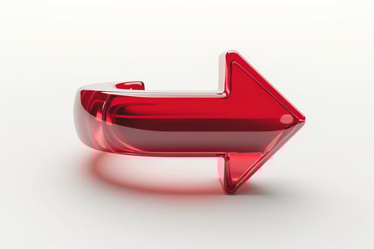 A glossy, three-dimensional red arrow pointing to the right, symbolizing direction and movement. photo