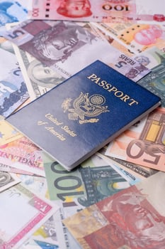 International passport of USA on a against the paper banknotes photo