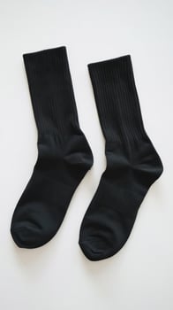 Black socks on a white background photo