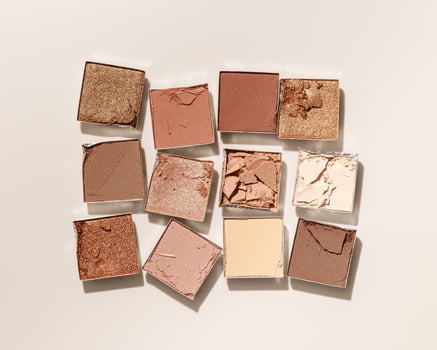 Natural color eye shadow makeup palette, crushed face powder swatch. Woman cosmetic and beauty product, aesthetic cosmetics still life beauty photography, beige color eyeshade pattern, above view photo