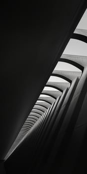 Black and white photograph of a curved wall photo