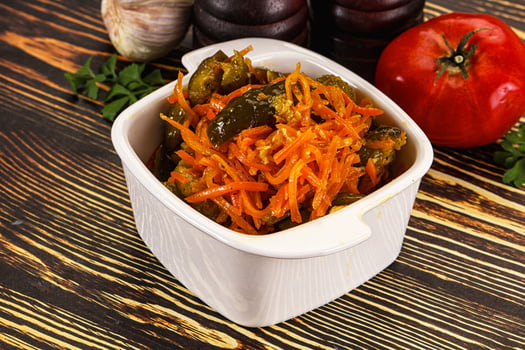 A white bowl filled with food photo