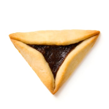 Triangle cookies for a holiday Purim on a white background. top view Traditional sweets for Jewish holiday. Hamantaschen cookies or Aman ears. photo