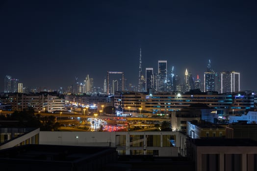 Stunning view of Dubai skyline at night featuring Burj Khalifa and city lights 4 photo