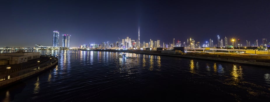 Stunning view of Dubai skyline at night featuring Burj Khalifa and city lights 11 photo
