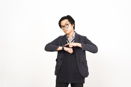 A man in glasses and a sweater making a heart photo