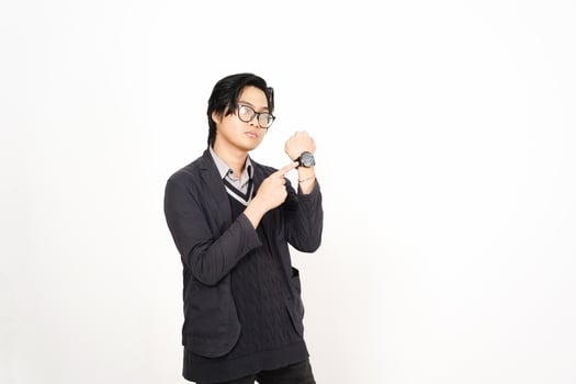 A man in glasses and a sweater is holding a watch photo