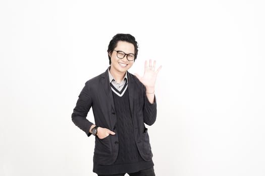 A man in glasses and a sweater is waving photo