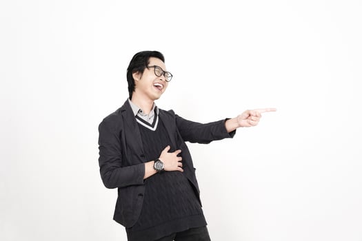 A man in glasses pointing at something photo