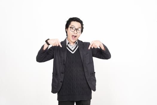 A man in glasses and a sweater is making a gesture photo