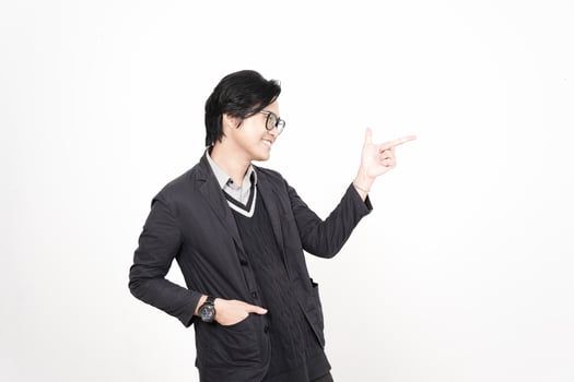 A man in glasses pointing at something photo
