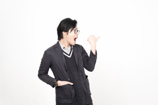 A man in glasses and a jacket is pointing his finger photo