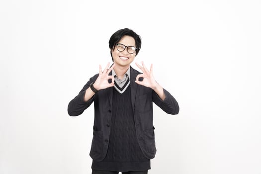 A man in glasses making an ok sign photo