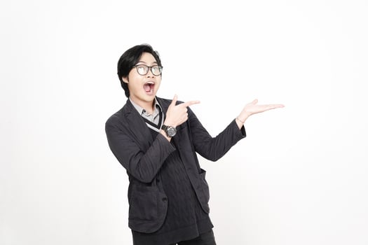A man in glasses pointing at something photo