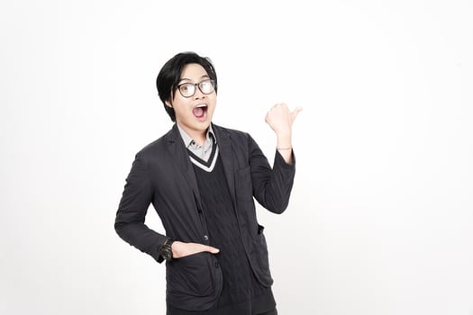 A man in glasses and a jacket is pointing his finger photo