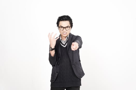 A man in glasses pointing at something photo