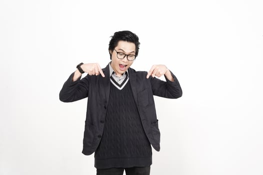 A man in glasses and a sweater is making a gesture photo