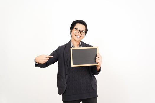 A man holding a blackboard and pointing at it photo