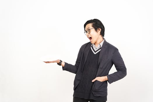 A man holding a plate with his mouth open photo