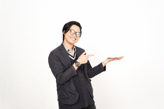 A man in glasses holding a white object photo