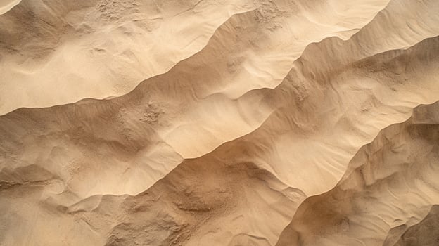 Desert sand dunes create a mesmerizing textured landscape, revealing nature's artistic patterns and undulating beauty. photo