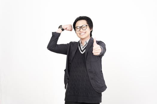 A man in glasses and a jacket giving a thumbs up photo