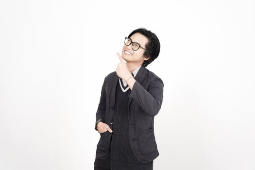 A man in glasses and a jacket is pointing up photo