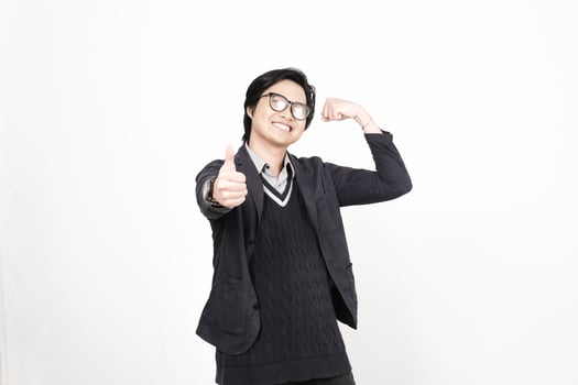 A man in glasses and a sweater is making a thumbs up photo
