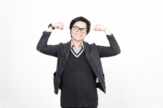 A man with glasses and a sweater is posing photo