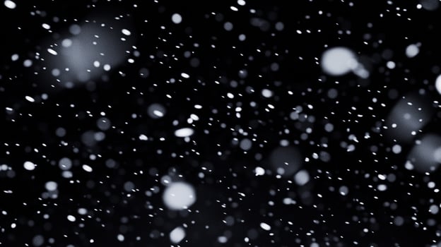 Floating white spheres against a black background create a dynamic visual effect, resembling movement or particles in a unique composition. photo
