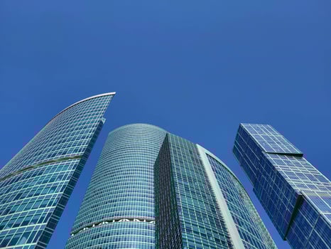 Moscow, Russia, 09 10, 2024 Background of modern architecture. The Federation skyscrapers in the Moscow City business district rise against the blue sky. photo